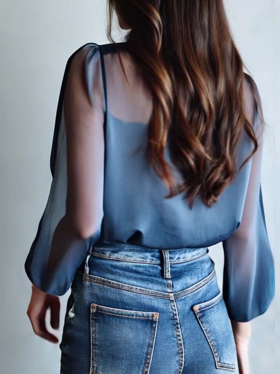 Casual women's blouse with a beautiful floral boho print, great for everyday summer style.