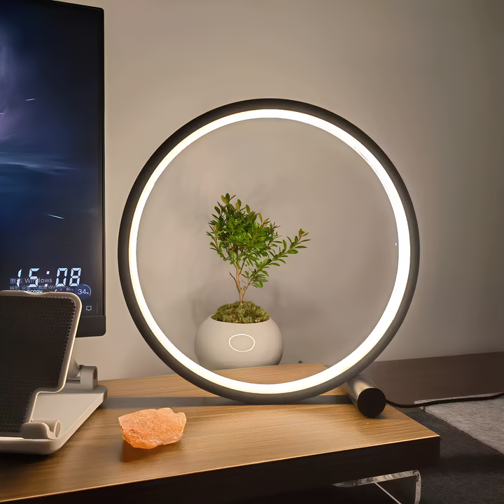 Stylish dimmable LED halo ring nightstand lamp, aluminum construction, ideal modern bedroom decor.
