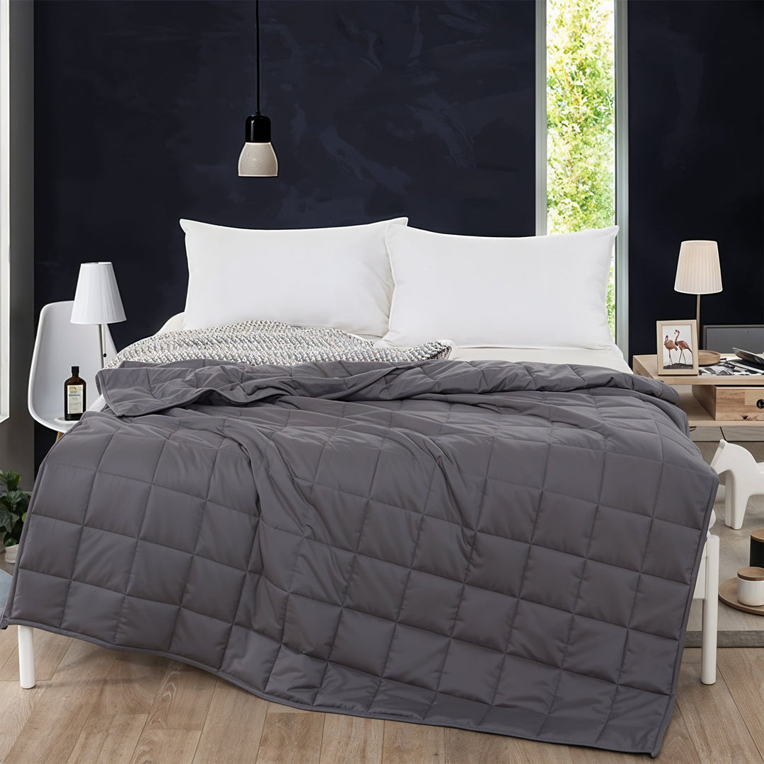 Unisex weighted blanket for calming sleep, stress & anxiety relief. Perfect bedroom essential.