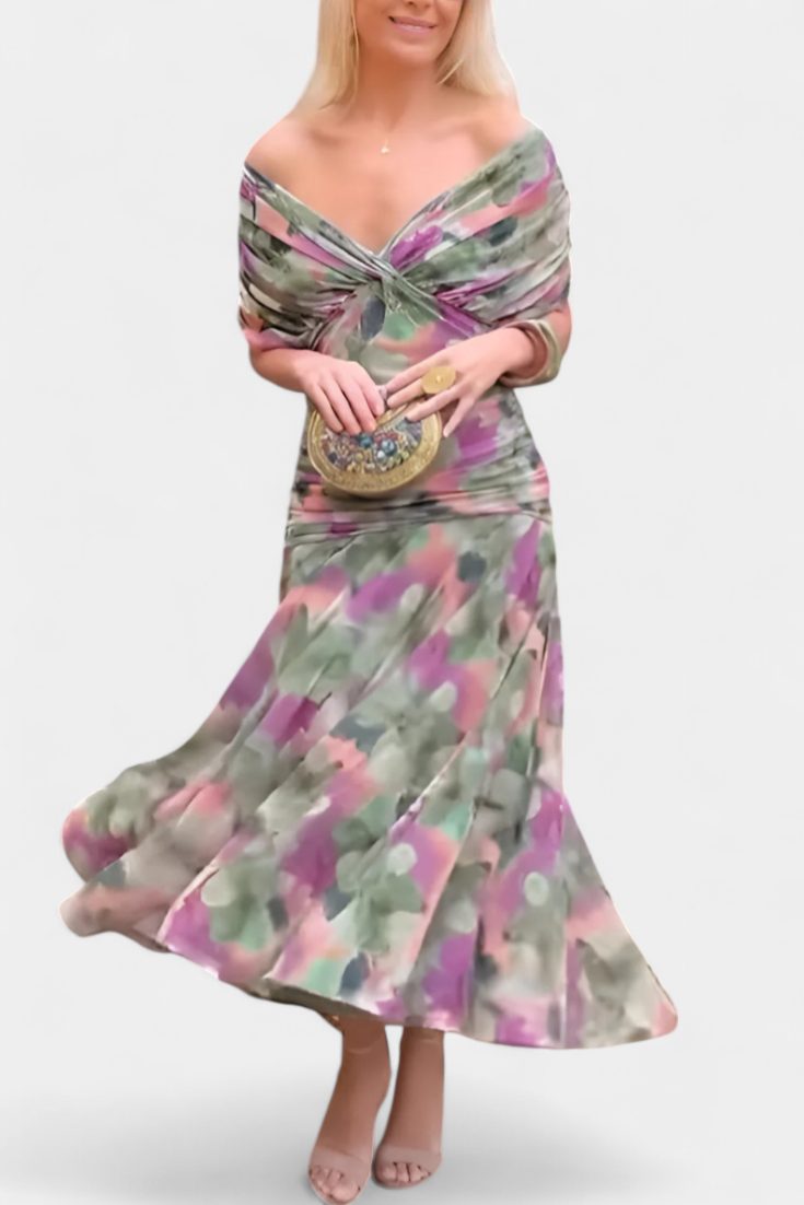 Detailed shot of the luxurious fabric texture of the elegant floral off-shoulder women's long dress.