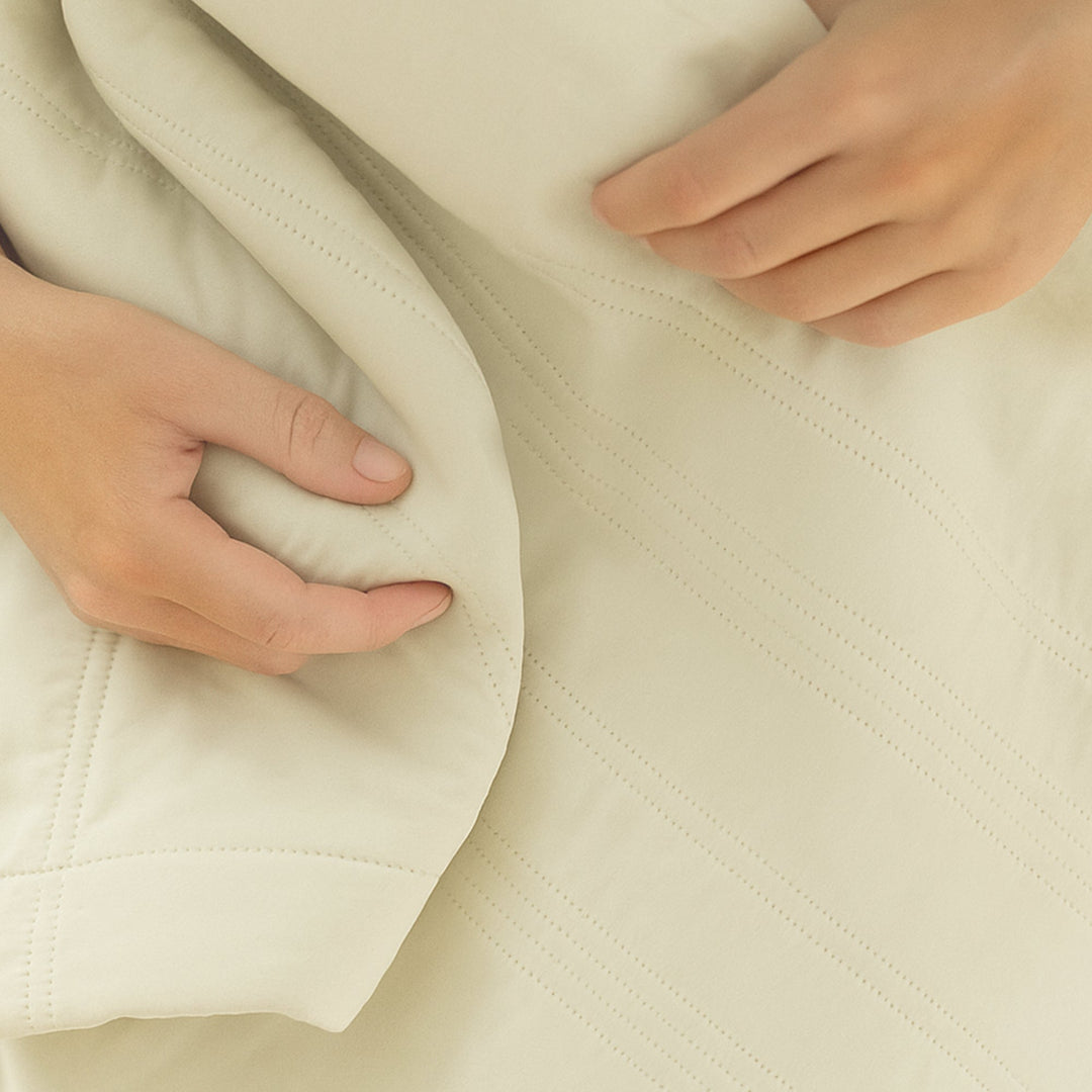 Deep sleep cooling blanket, ideal for hot sleepers seeking calming, breathable summer comfort.