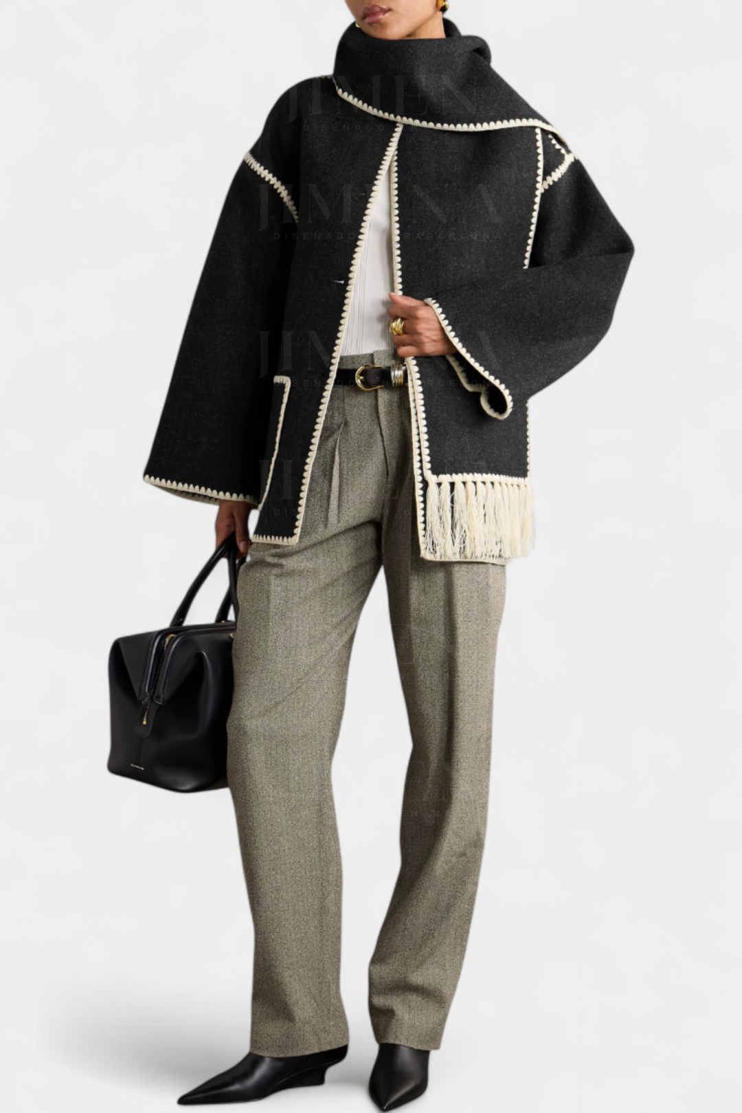 Cozy and elegant women's fringe-trim scarf coat, perfect stylish outerwear for cold weather.