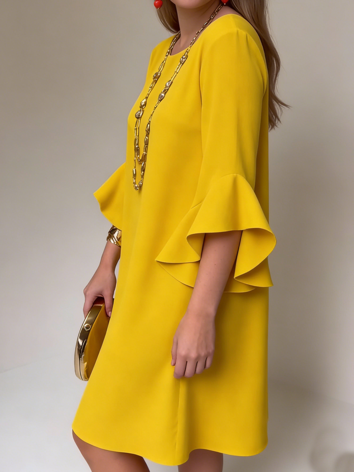 Chic women's shift dress featuring stylish ruffle bell sleeves, ideal for spring & summer fashion.
