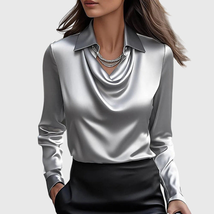 Chic women's flowing fit blouse with elegant pleated neckline, versatile for office fashion or casual outfits.