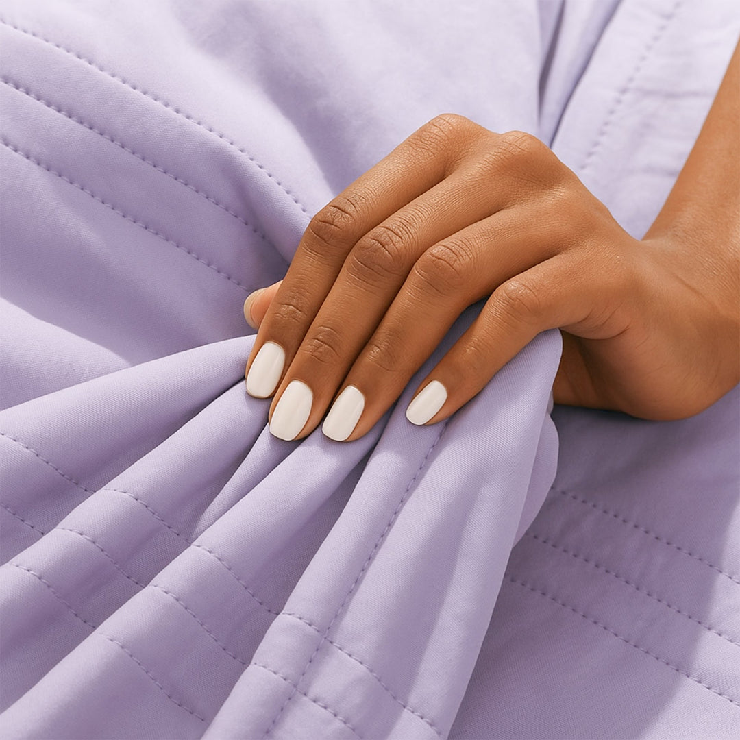 Unisex breathable cooling blanket for hot sleepers, ensuring calming and comfortable summer nights.