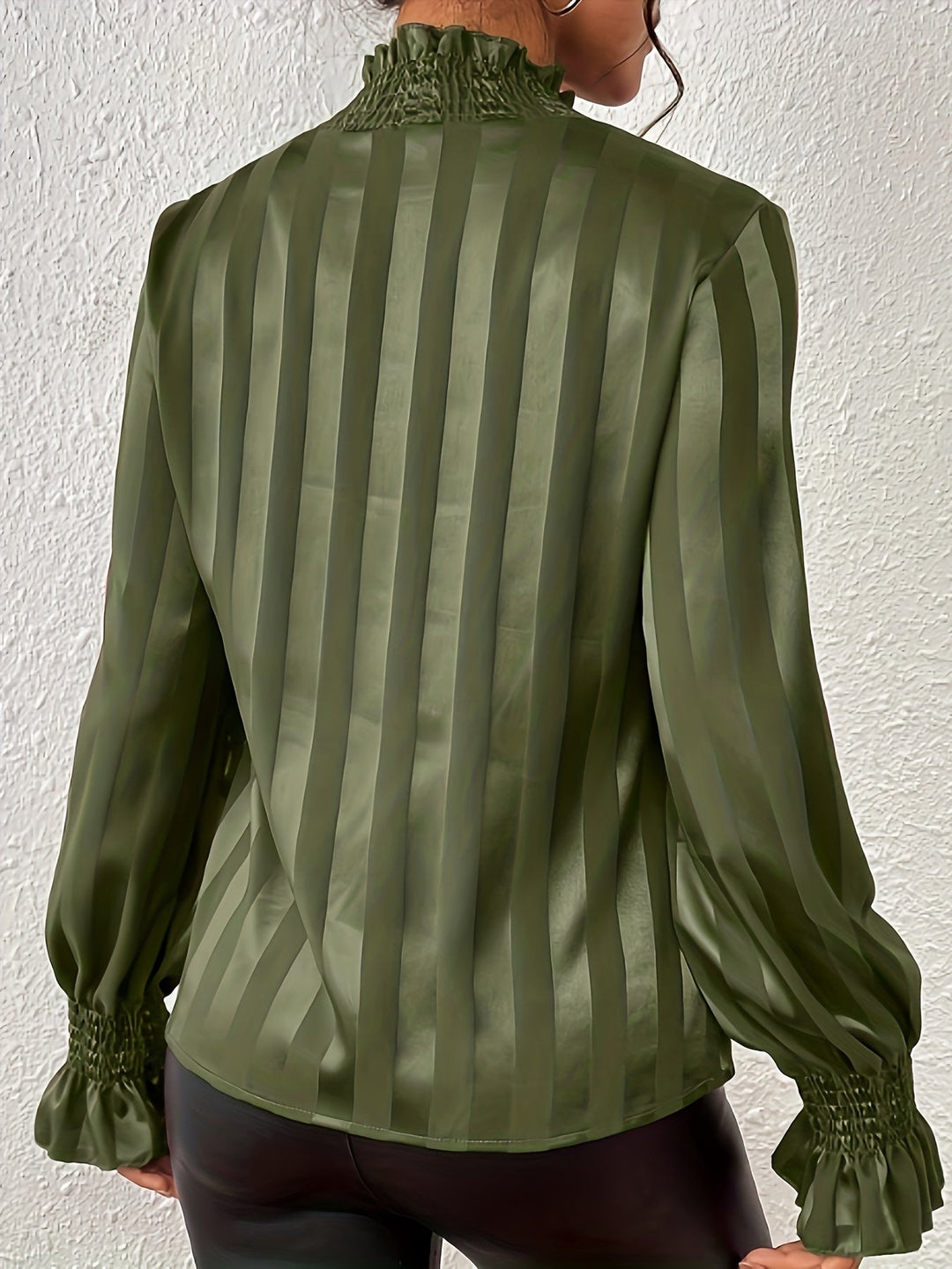 Stylish beige women's high neck blouse with stripes, long sleeves, a professional and comfortable top.