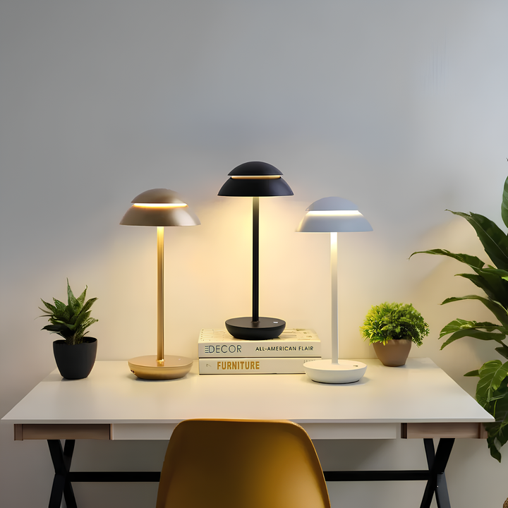 Lightweight portable LED table lamp being carried, rechargeable and cordless. Nordic minimalist design.