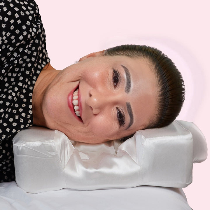 Unisex beauty & neck support pillow with silky satin pillowcase for comfortable, anti-aging sleep.