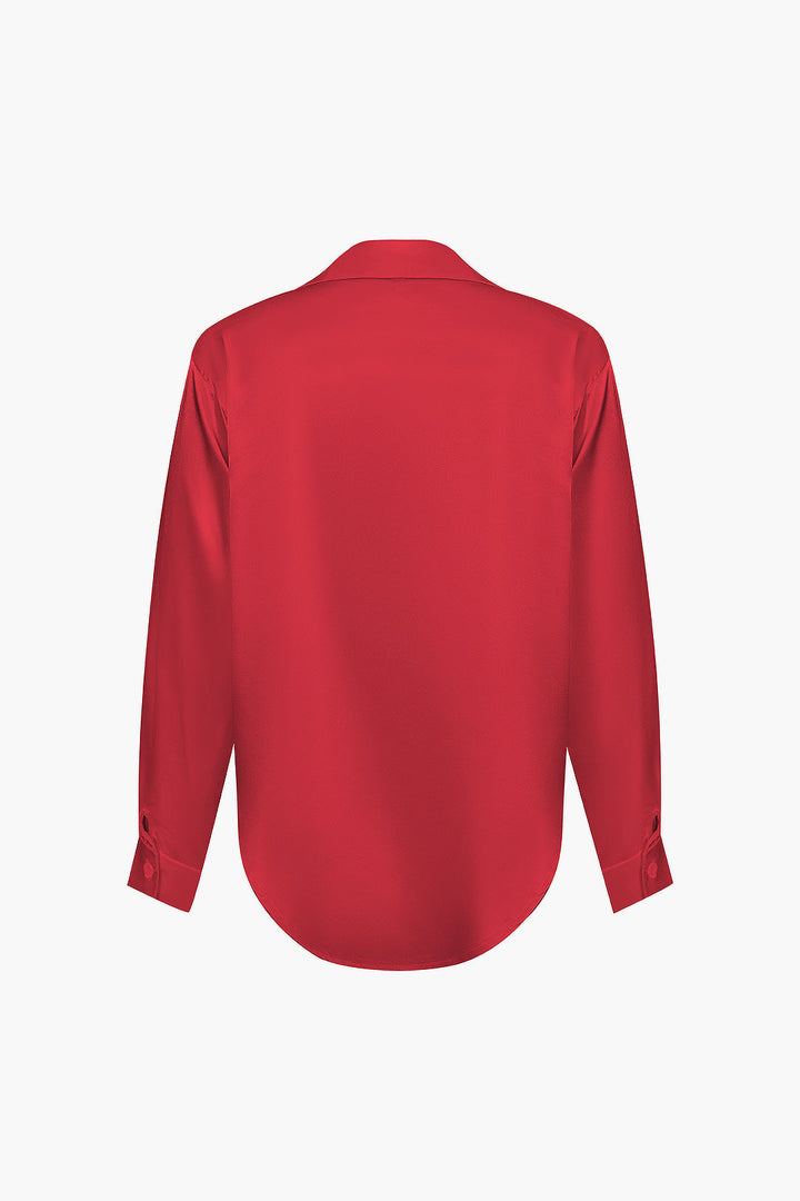 Trendy women's elegant long-sleeve shirt, a stylish button-down top.