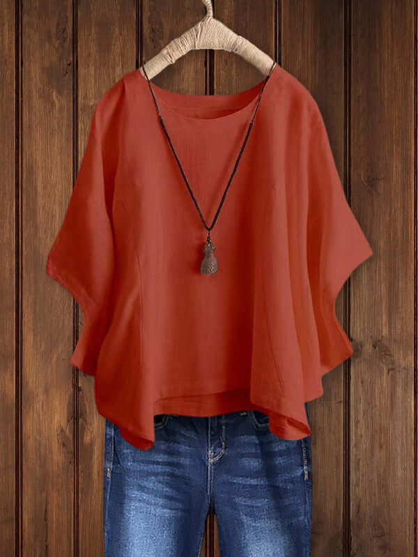 Summer-ready women's crew-neck dolman tunic blouse, offering a relaxed fit for stylish daily wear.