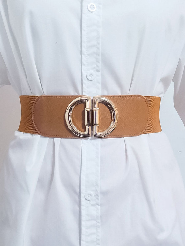 Bold wide elastic cincher belt for women, accented with a shiny gold buckle, a fashion statement.