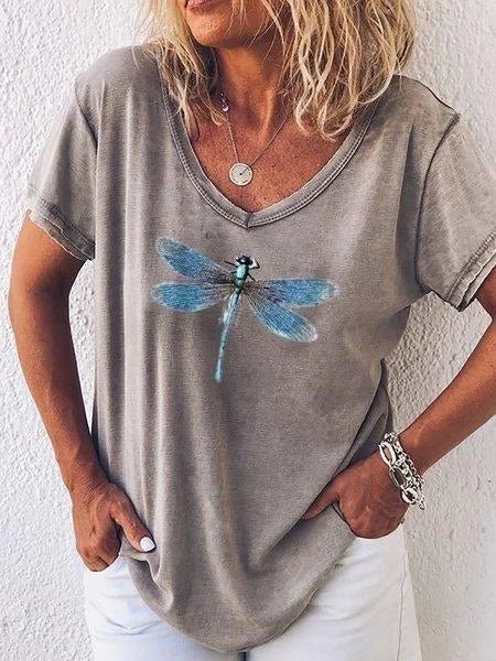 Comfortable women's short-sleeve V-neck graphic tee featuring a stylish dragonfly design. Relaxed fit for everyday.
