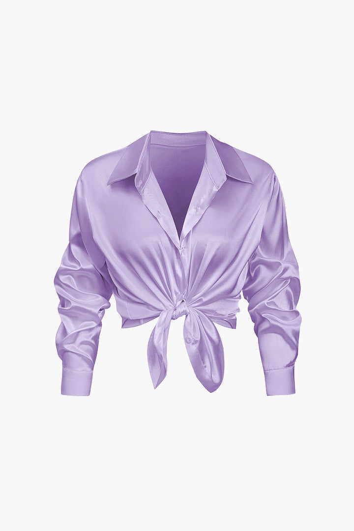 Fashion-forward women's elegant long-sleeve shirt, a timeless button-down.