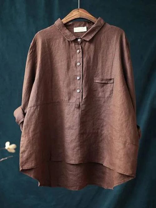 Navy blue women's blouse, a versatile workwear staple & elegant fashion choice with a flattering fit.