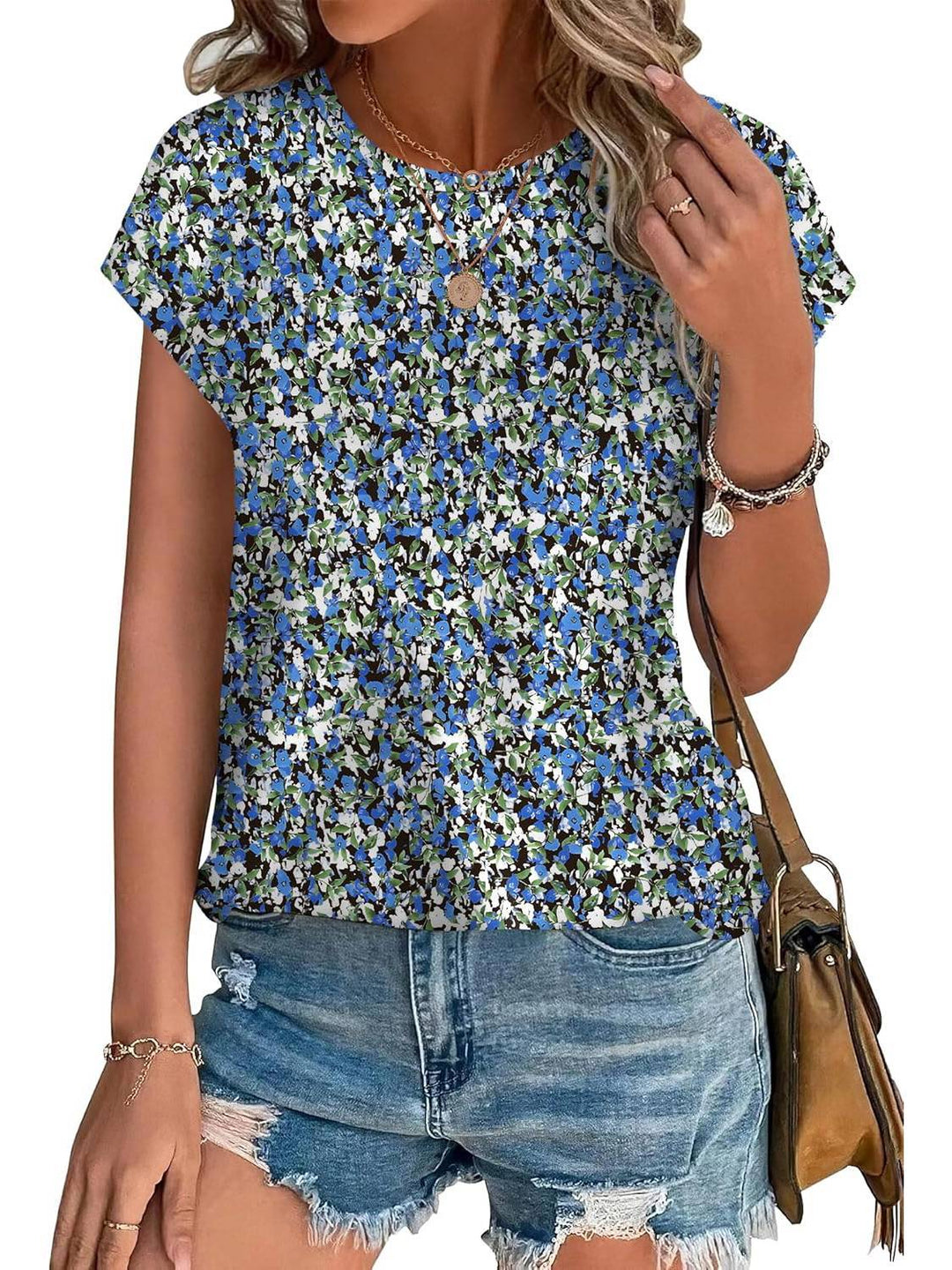 Elegant floral printed women's top, short sleeve and perfect for spring/summer.