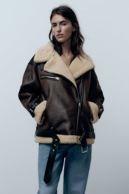 Front view of a women's brown lapel insulated jacket, water-repellent, offering elegant all-season protection.
