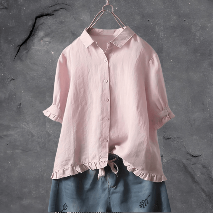 Fashionable women's long-sleeve blouse with a modern design, suitable for elegant and casual everyday style.