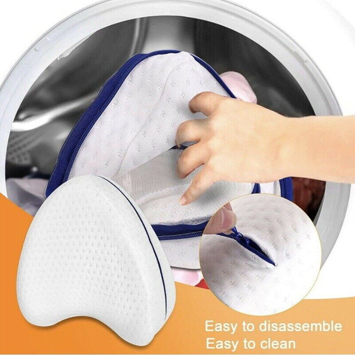 Side sleeper leg support pillow with ergonomic design for ultimate hip & knee comfort & alignment.