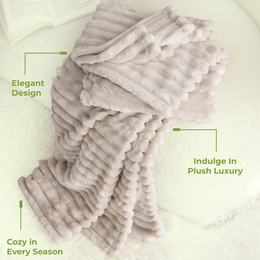 Cozy comfort soft fleece blanket, a luxurious throw perfect for relaxing or as elegant bedding.