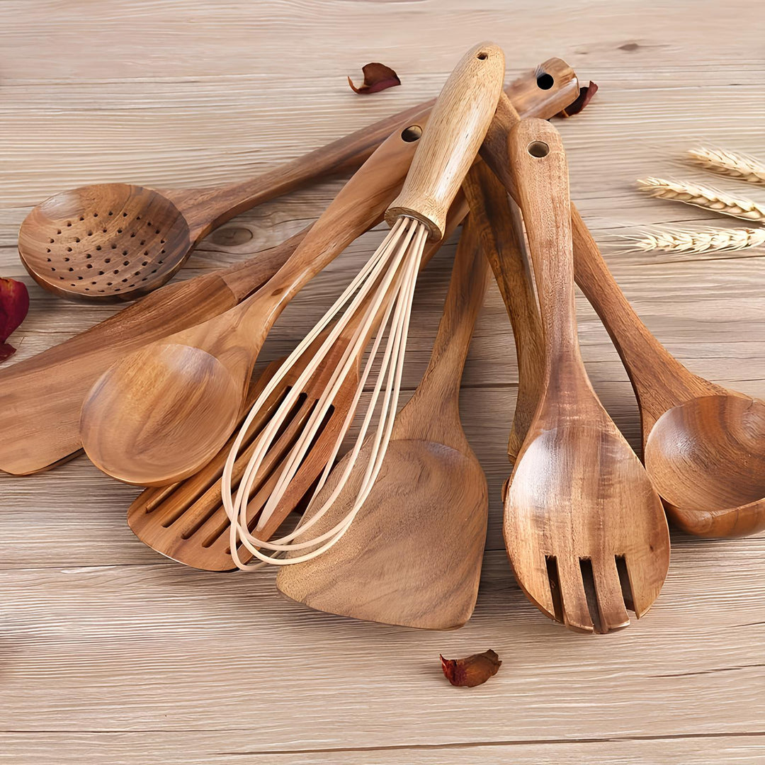 Eco-friendly 11-piece teak wood kitchenware set. Includes wooden tools and a matching holder for organized cooking.
