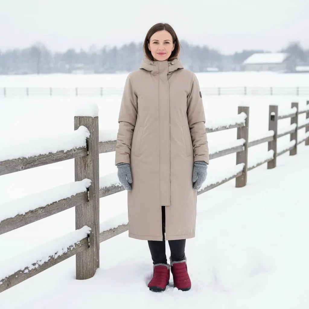 Blue women's waterproof snow boots, comfortable and cozy for cold weather activities.