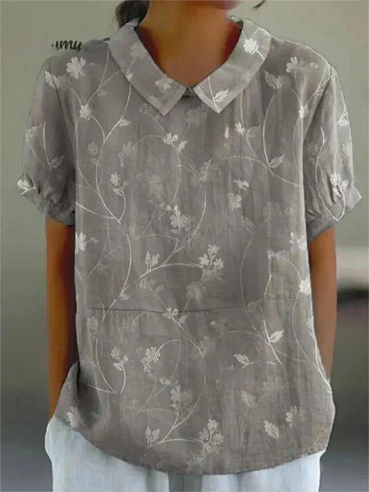Women's relaxed fit casual shirt. Effortless short sleeve top, provides all-day comfort & versatile summer style.