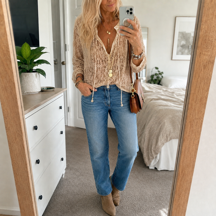Elegant women's boho lace V-neck blouse, relaxed fit, perfect for casual summer outings. Feminine and versatile top.