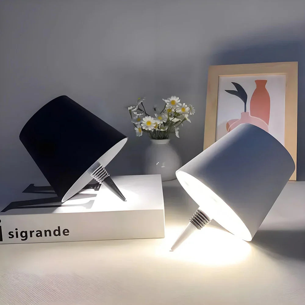 Portable rechargeable bottle light, perfect for ambient lighting on tables or patios.