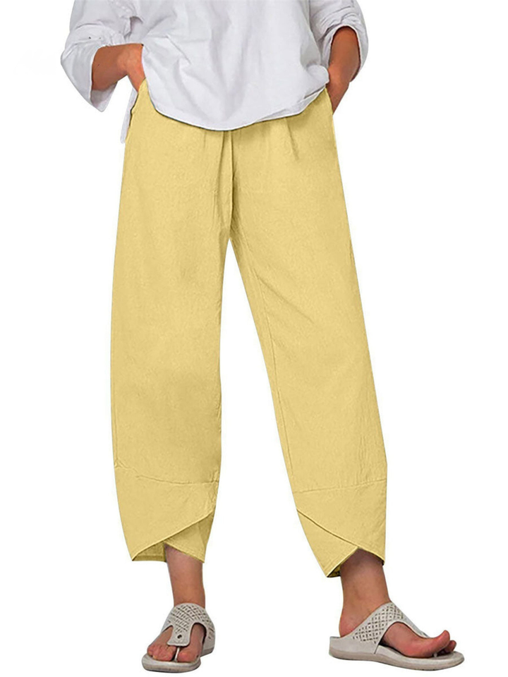 Women's linen harem trousers with comfortable elastic waist, loose fit wide leg pants for casual style.