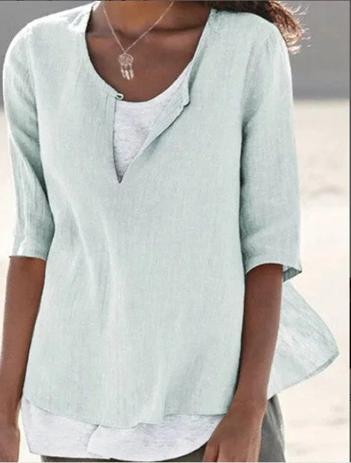 Women's V-neck knit tunic blouse, loose fit, 3/4 sleeve, comfortable and stylish for everyday wear.