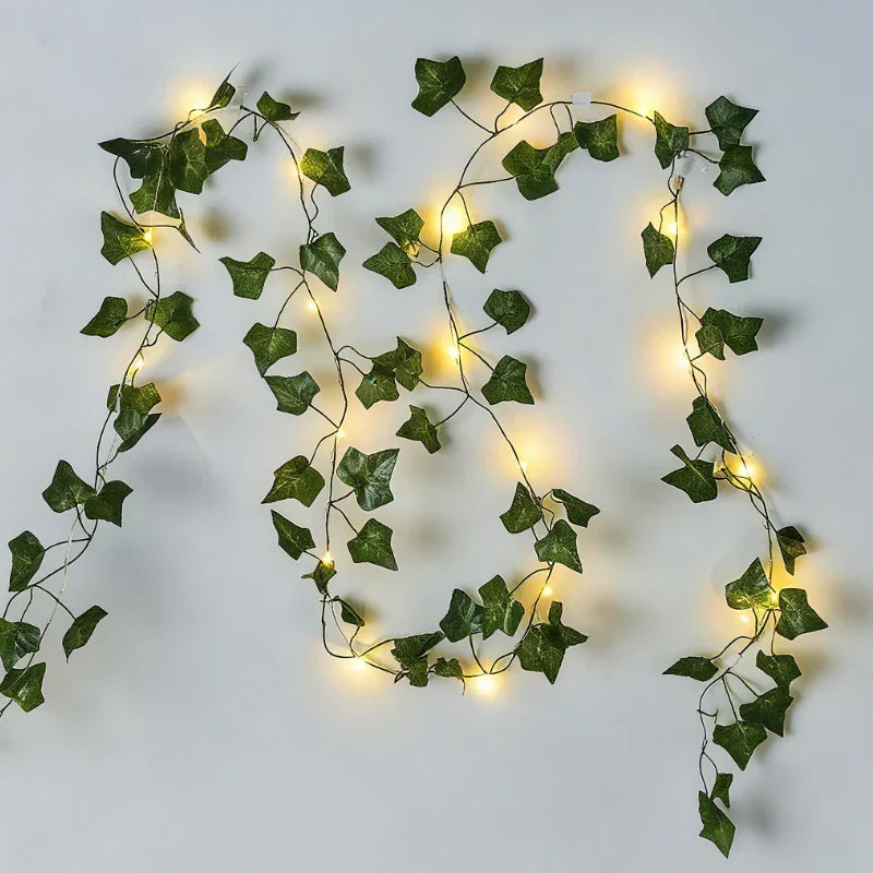 Warm white LED leaf garland string lights, offering a beautiful, subtle glow for any setting.
