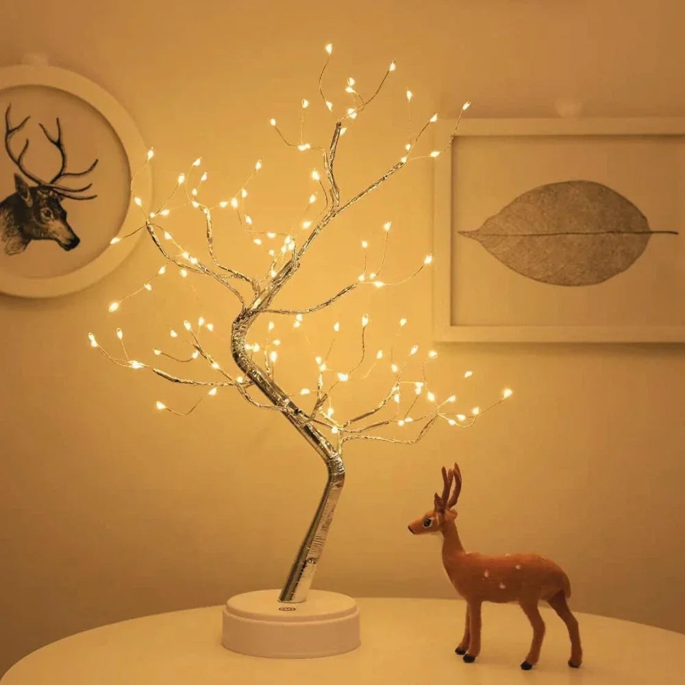 Close-up of warm white LED fairy lights on a flexible branch of the Bonsai Tree Lamp table decor.