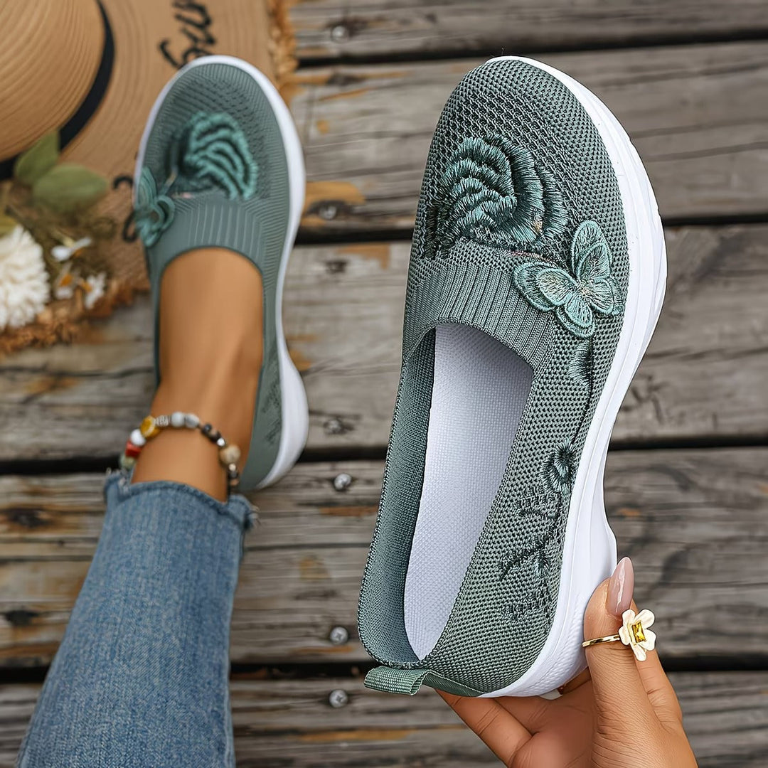 Women's comfortable knit slip-on walking trainers for everyday wear.