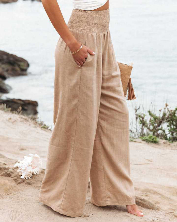 Stylish wide leg linen pants for women, elegant flowy design, perfect for versatile summer outfits.