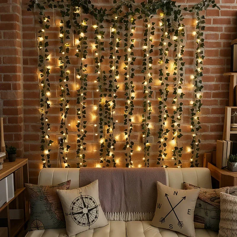 Indoor warm white LED leaf garland lights, perfect for shelving, mirrors, or window displays.