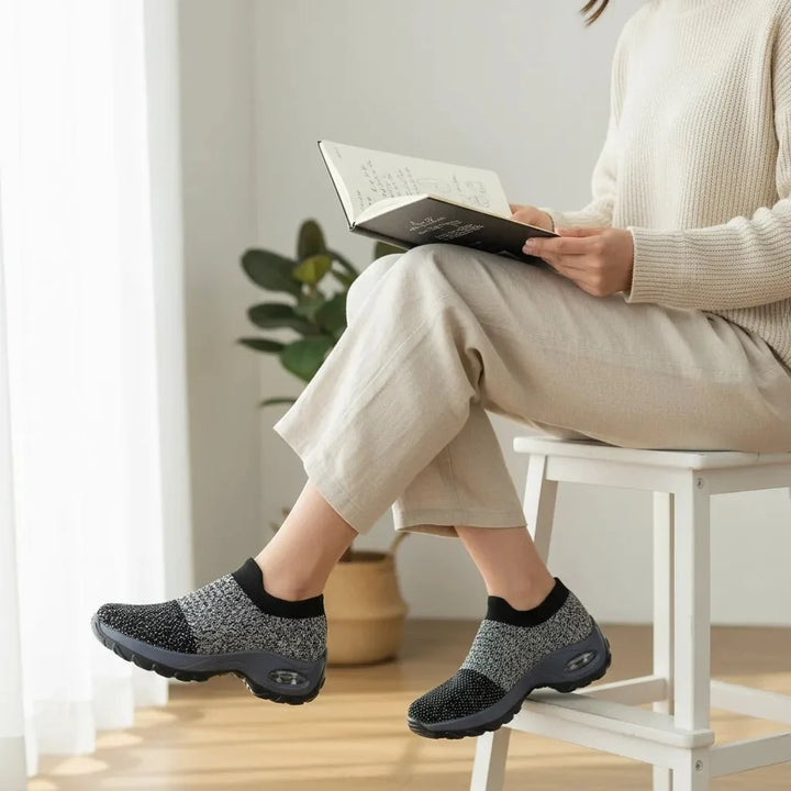 Stylish Grey women's slip-on casual sneakers, offering arch support for versatile wear.