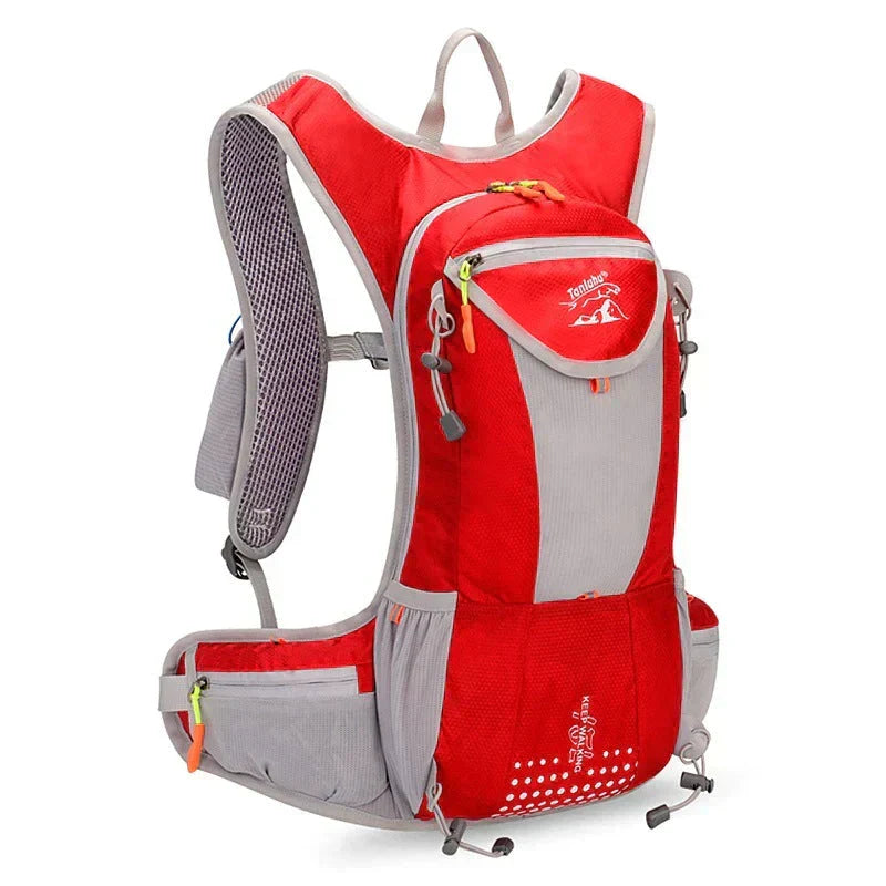 Close-up of the adjustable chest strap and whistle buckle on a lightweight outdoor hydration backpack.