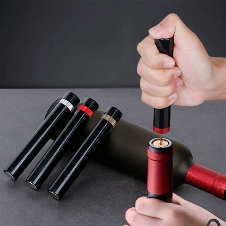 Unisex air pressure wine opener for effortless cork removal. Stainless steel barware tool.