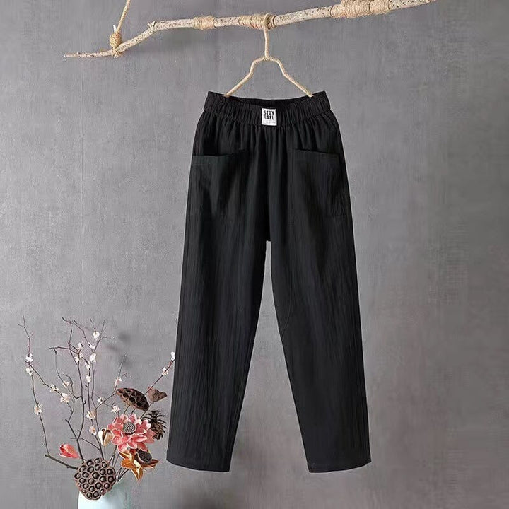Lightweight linen blend women's casual pants, wide leg with elastic waist and pockets, perfect for summer outings.