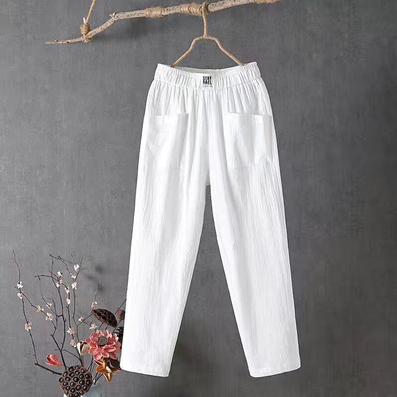 Solid color ladies' linen blend casual wide-leg trousers, featuring an elastic waist and pockets for stylish comfort.
