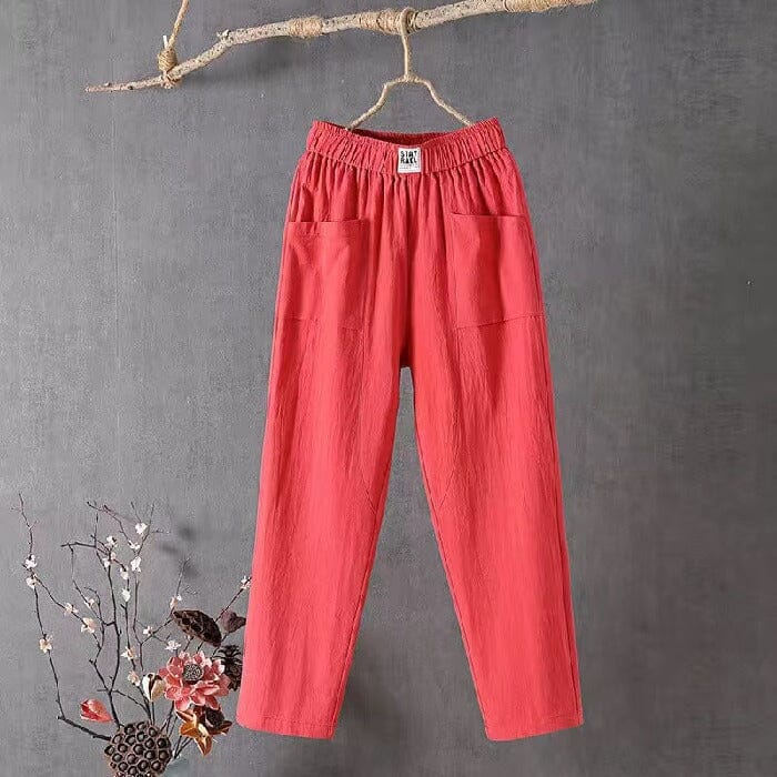 Women's relaxed fit linen blend casual pants with convenient pockets and an elastic waist, perfect for warm weather.