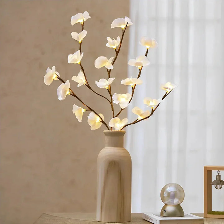 Twig lights featuring LED flowers, a charming battery operated accent for any decor.