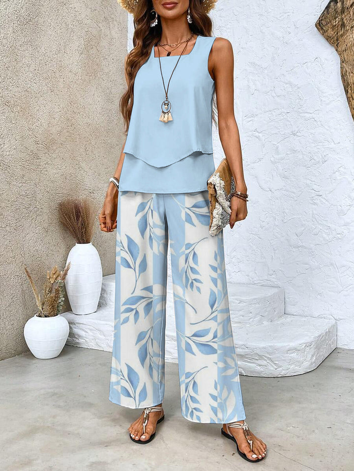 Women's stylish cotton blend two-piece summer outfit set with wide leg pants & sleeveless top. Comfortable fashion.