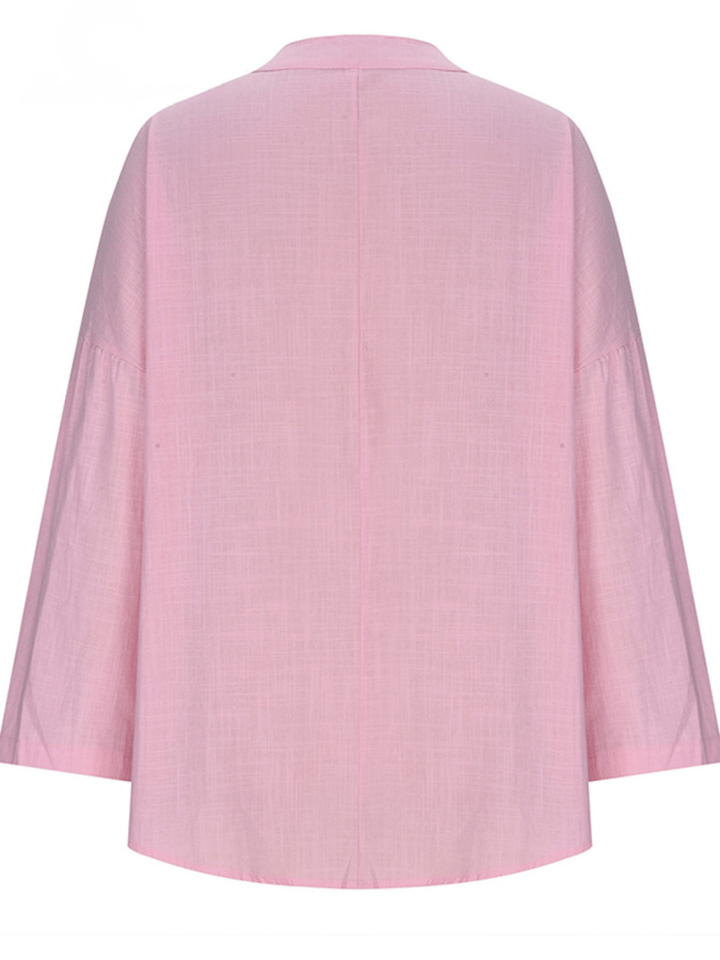 Fashionable ladies relaxed fit V-neck long sleeve tunic blouse. Casual & stylish everyday top.