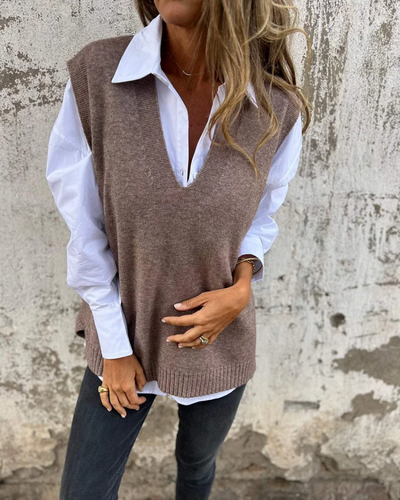 Elegant women's soft knit vest, ideal for layered fashion or casual chic. Versatile sleeveless top for fall.