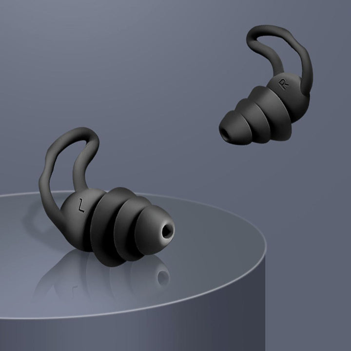 Ergonomic silicone earplugs designed for maximum comfort and quiet sleep.
