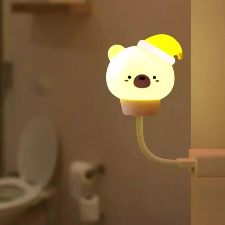 Animal character LED night light, a soft bedside lamp for kids' room, creating a gentle nursery glow.