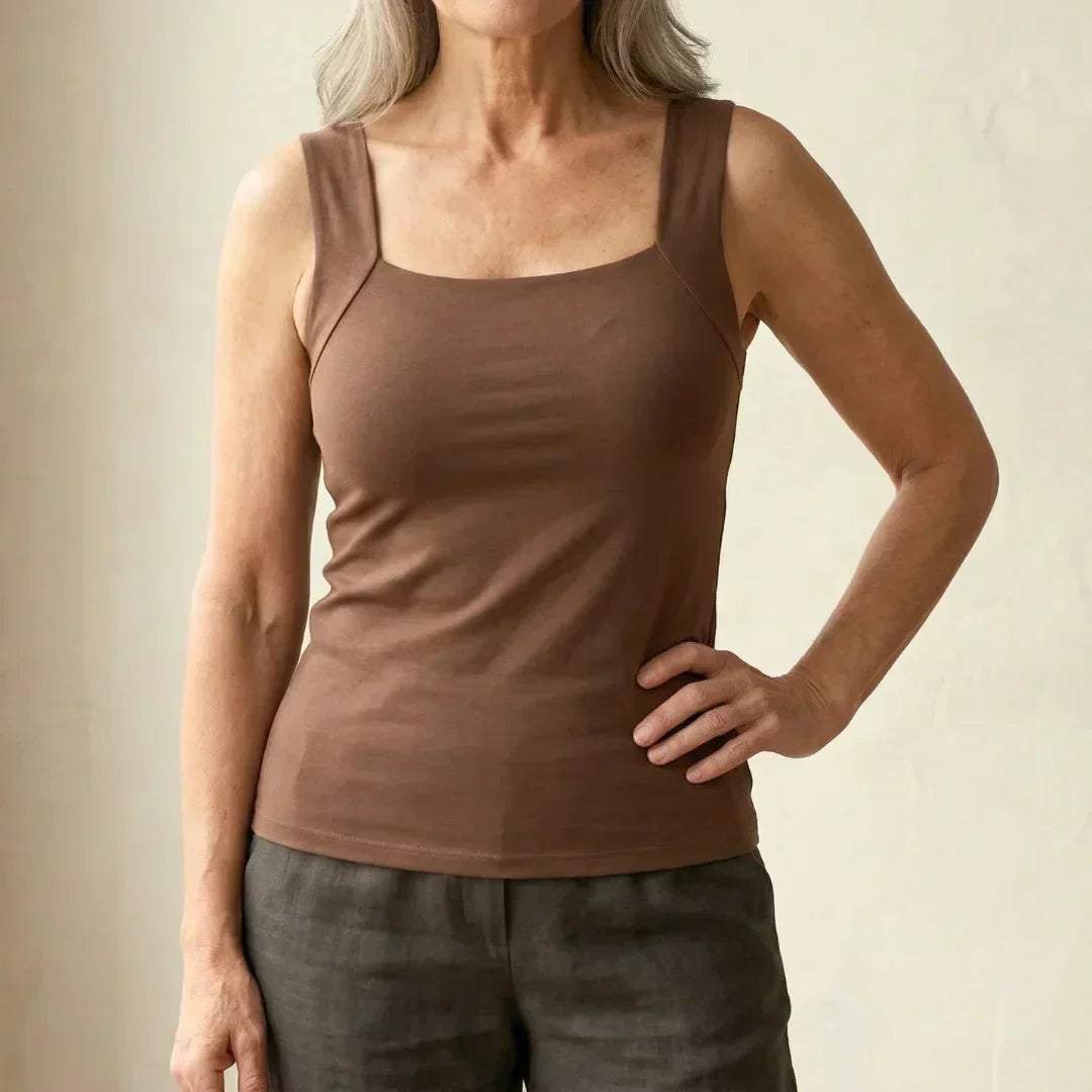 Women's built-in bra tank top provides seamless support & comfort for everyday wear.