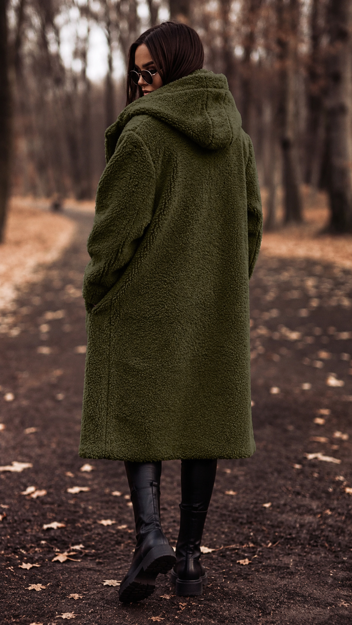 Cozy women's hooded long coat, perfect for fall and winter warmth and elegant outerwear.