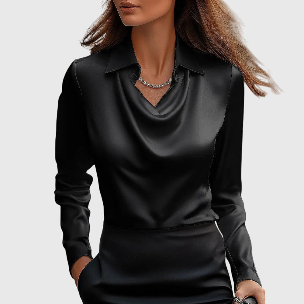 Long sleeve women's blouse featuring a stylish pleated neckline & comfortable flowing fit for versatile wear.